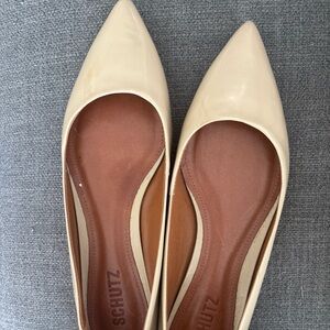 Beige schutz flats